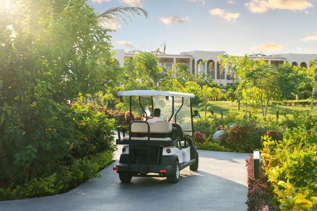The Mora Zanzibar Hotel Matemwe  Ngoại thất bức ảnh Golf cart at the Four Seasons Resort
